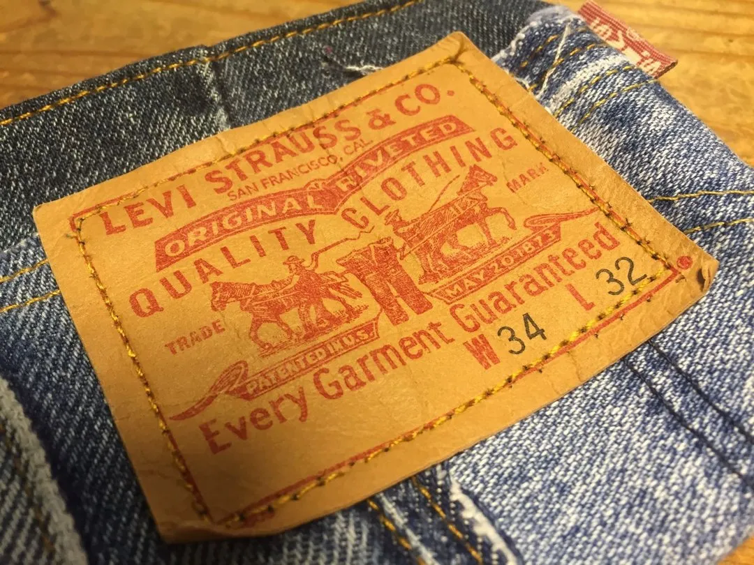 First Edition — Jeans Label Coin Bag